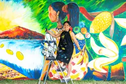 Folklife stars: Maya artist, Bolivian rappers, Dolly Parton's guitar restorer